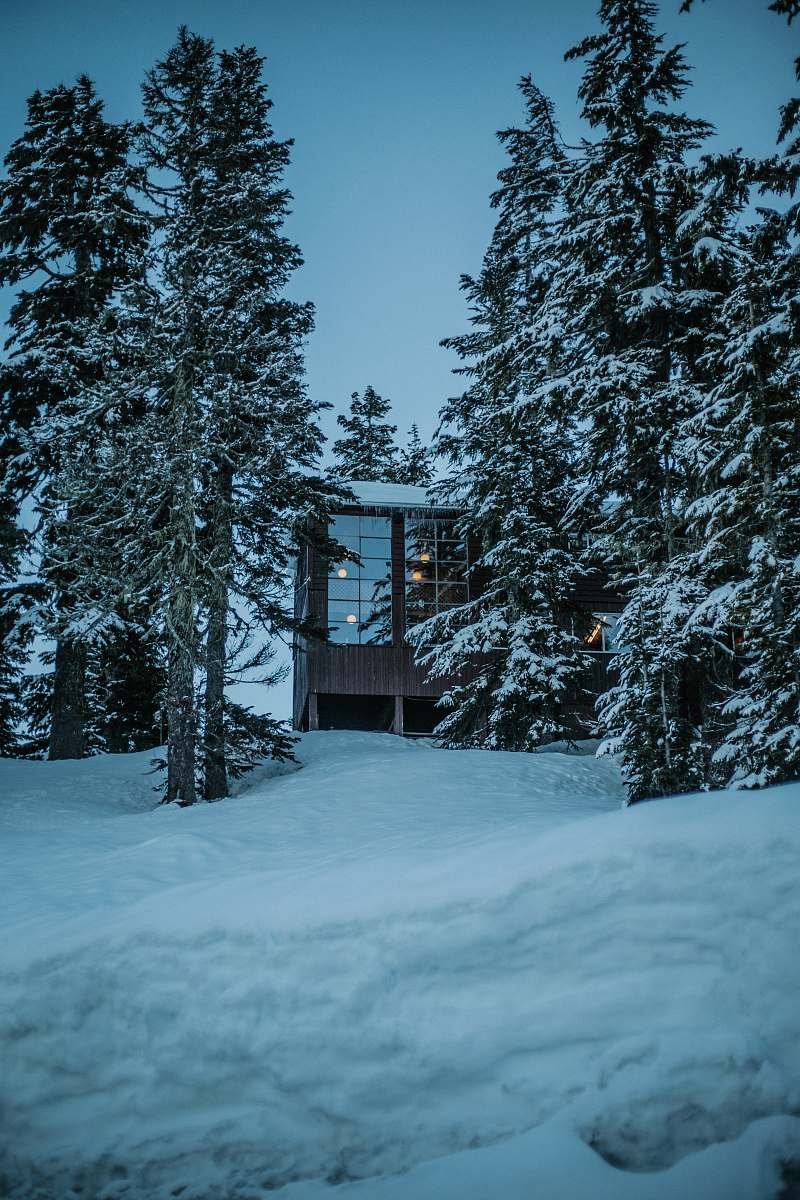 the mountaineers baker lodge house surrounded with trees deming